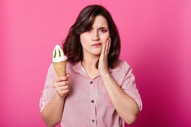 Beat Tooth Sensitivity: Solutions for Hot, Cold & Sweet Pain