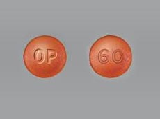 Round Red Oxycontin OP 60 mg Pills or Tablets